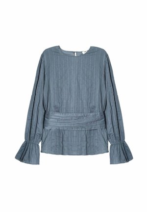 Blouse grise à manches longues avec des rayures verticales, col rond, manches évasées et taille cintrée, présentant un tissu texturé.