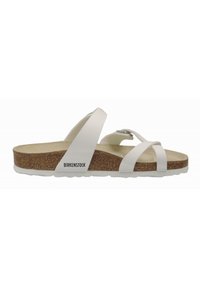 Sandali Birkenstock bianchi con plantare in sughero, multiple cinghie incrociate e suola bianca. Presentano un logo sul lato.