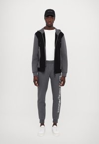 EA7 Emporio Armani PANTALONI - Tréningruha alsók - dark grey mel