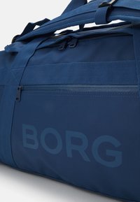 Björn Borg DUFFLE BAG 55L UNISEX - Športna torba - blue wing teal