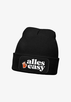 Black knitted beanie hat with a folded cuff. Features a rectangular patch displaying "alles easy" in white and orange text, with a hand graphic.