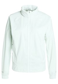 Veste blanche zippée avec col haut et manches longues, avec poches latérales zippées et poignets élastiques.