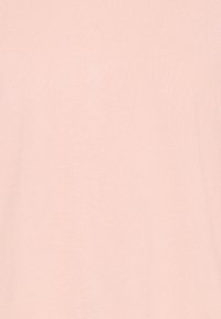 Tissu côtelé rose clair avec une texture lisse, présentant un design simple sans motifs visibles ni détails supplémentaires.