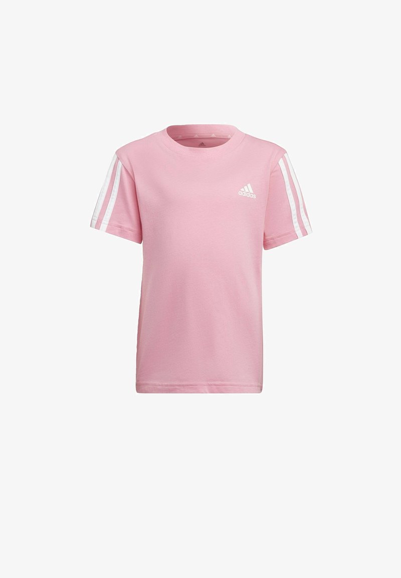 Różowa bawełniana koszulka z okrągłym dekoltem, krótkimi rękawami i białymi akcentami w trzy paski na ramionach. Na piersi znajduje się logo Adidas.