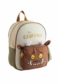 Ljust beige och grön tygryggsäck med rundad form. Har en brun dragkedjefrontficka med ett Gruffalo-ansiktsdesign och 3D-detaljer.