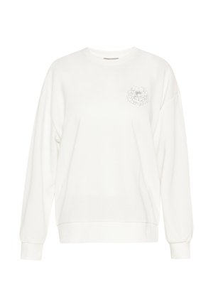 Bela majica s okroglo ovratnico, spuščenimi rameni in dolgimi rokavi. Ima subtilen cvetlični obris na levem prsnem delu. Mehka tekstura.