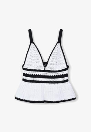Bralette en crochet noir et blanc avec un décolleté en V, des bretelles fines et un peplum évasé. Présente des accents rayés et des motifs texturés tout au long.
