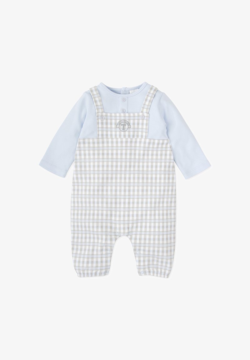 Top de manga larga azul debajo de un peto de cuadros grises y blancos con cierres a presión. Presenta un logotipo circular en la parte superior izquierda del frente.