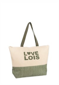 Bolsa de tela con un cuerpo color crema y un fondo texturizado verde. Presenta letras verdes que dicen "LOVE LOIS" y dos asas de tela resistentes.