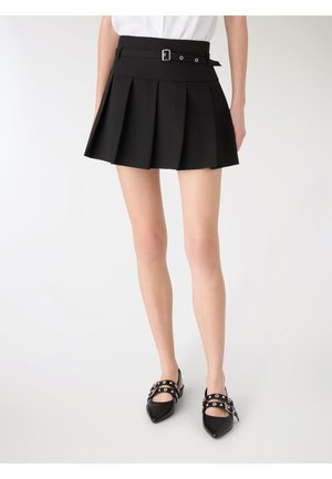 - Spódnica trapezowa