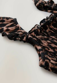 Next Overall / Jumpsuit - animal print