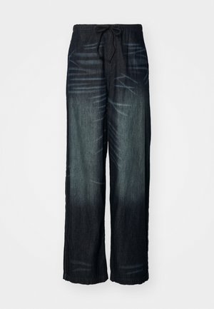 Weite Jeans mit allmählichem Farbverlauf in dunklem Denim. Verfügt über einen elastischen Bund mit Kordelzug. Glatte Textur mit dezenten Abnutzungsspuren.