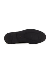 Suela de zapato negra con superficie de goma lisa, patrón texturizado para agarre y tamaño 42 estampado. Bordes curvados y talón definido.