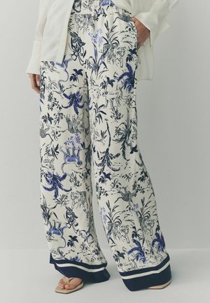 Next Kalhoty - white blue animal print