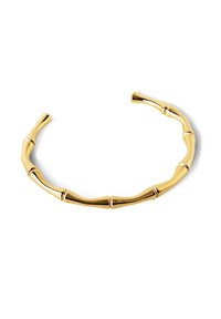 Bracciale in tono oro con un design ispirato al bamboo, caratterizzato da segmenti cilindrici e una texture liscia e lucida. Aperto alle estremità per un facile indossamento.