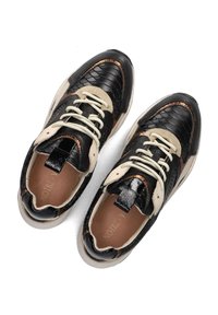 Black and cream sneakers featuring a textured leather upper, beige accents, flat laces, and a rubber sole. Notable metallic details.