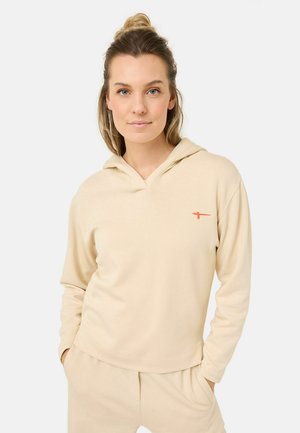 Beige hoodie met een relaxte pasvorm, V-hals ontwerp en lange mouwen. Beschikt over een klein oranje logo aan de linkerkant. Zachte stofstructuur.