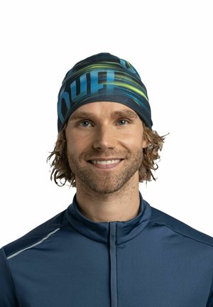 Multicolored performance headband in blue, green, and black with a snug fit. Made from lightweight, stretchy fabric. Clear brand logo displayed.
