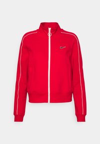 Röd dragkedjetröja med hög krage, vita detaljer och Nike-logotyp. Gjord av mjukt tyg, med sidofickor och ribbade muddar.