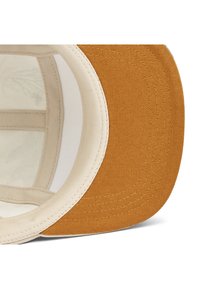 A brown cap with a flat brim and a beige interior. The fabric is textured, featuring visible stitching along the edges.