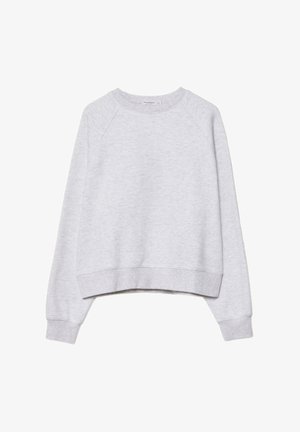 Siva skraćena dukserica od mekane, teksturirane tkanine. Ima duge raglan rukave i rebraste manžete i donji rub. Jednostavan, neutralan dizajn.