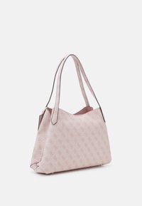 Rosa tygväska med mönstrad yta, slät textur, dubbla handtag i matchande färg och ett mjukt innerfoder. Accenter i mörk kant.