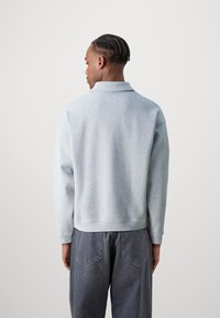 Lacoste Bluză de molton - silver