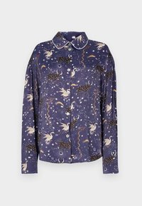 Chemise bleu marine à boutons avec un motif céleste comprenant des licornes, des constellations et des tourbillons, finition avec un col contrastant et une texture de tissu.