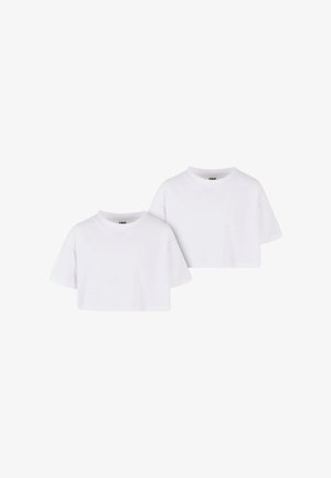 Witte korte mouwen crop tops met een ronde halslijn en een gladde textuur. Elk shirt heeft een minimalistisch ontwerp zonder patronen.