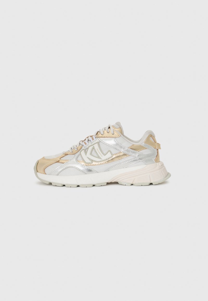 White and metallic gold running shoes with mesh and synthetic upper, padded collar, and textured rubber sole, featuring logo accents.