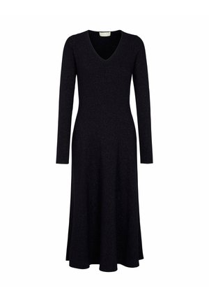 Robe noire à manches longues avec un décolleté en V, réalisée en tissu côtelé, d'une forme évasée fluide, arborant une texture légèrement scintillante.