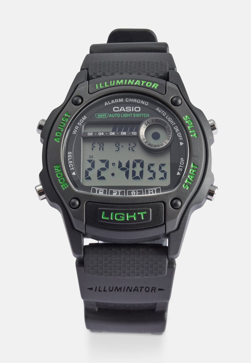 Skaitmeninis Casio laikrodis su juodu plastikinio korpusu ir dirželiu, žaliais akcentais, apvaliu ciferblatu, LCD ekranu ir įvairiais funkcijų mygtukais.