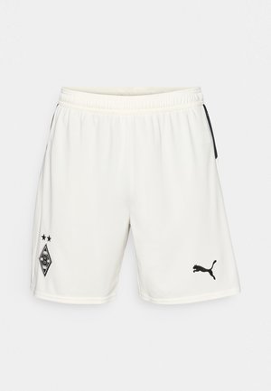 Vita sportshorts i lättviktig tyg, med en svart logotyp på vänster ben och svarta sidopaneler. Med elastisk midja.