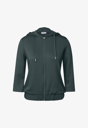 Mörkgrön zip-up hoodie i mjukt material med en åtsittande elastisk midja, huva med snörning och silverfärgad dragkedja.