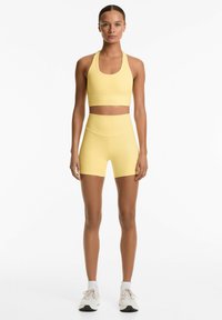 OYSHO STRAPPY BACK - Sport-bh met light support - yellow