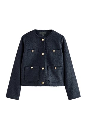 Navy blue wool blend jacket with a round neckline, gold buttons, and two breast pockets. Textured fabric and cropped design.