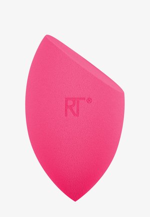 Bright pink angled makeup sponge with smooth texture and a flat edge for precise application.