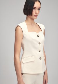 adL Weste - vanilla