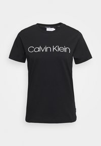 Černé bavlněné tričko s kulatým výstřihem a krátkým rukávem, na přední straně s bílým potiskem loga "Calvin Klein".