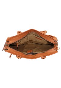Braune Leder-Tote-Tasche in Mittelgröße mit geräumigem Innenleben, ausgestattet mit einem Reißverschluss, Innenfächern und einem weichen, hellbraunen Futter.
