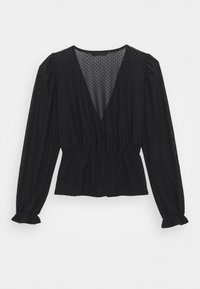 Schwarze Bluse mit tiefem V-Ausschnitt, langen Ärmeln und elastischem Bund. Texturiertes Material mit kleinem Punktmuster, geraffte Ärmel mit Rüscheneffekt.