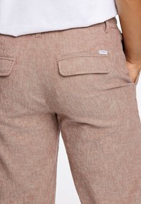 Lindbergh Pantaloni - burnt clay