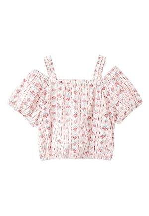 Haut blanc à épaules dénudées avec manches courtes bouffantes. Orné de motifs floraux rouges et de rayures verticales. Ourlet et bretelles élastiqués.