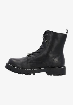 Bottine noire en cuir à lacets, avec semelle épaisse crantée et languette arrière pour faciliter l'enfilage.
