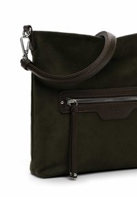 Green suede bag with a brown leather strap. Features a zippered pocket on the front and a smooth texture with understated branding.