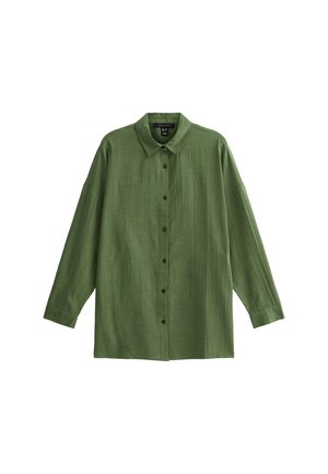 Green button-up shirt with long sleeves, made of textured fabric. Features a collar and vertical seam detailing along the front.