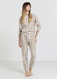 Set pigiama in due pezzi con motivo pied de poule, caratterizzato da una combinazione di colori beige e bianco, maniche lunghe e vita elasticizzata con coulisse.