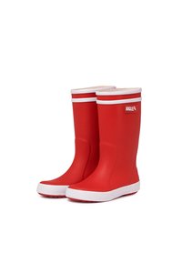 Bottes de pluie en caoutchouc rouge avec des accents blancs, présentant une texture lisse, un bout légèrement arrondi et une patch de marque sur la tige.