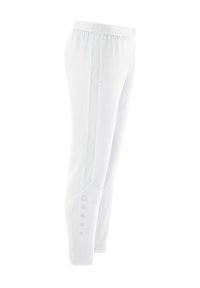 Witte sportbroek met een getailleerd ontwerp, elastische tailleband, gestructureerde zijpanelen en knopenaccenten bij de enkel. Glad fabricagestof.