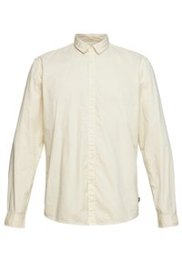 Lichtcrème lange mouw overhemd gemaakt van stof met een subtiel stippenpatroon. Beschikt over een button-down kraag en een knoopsluiting aan de voorkant.